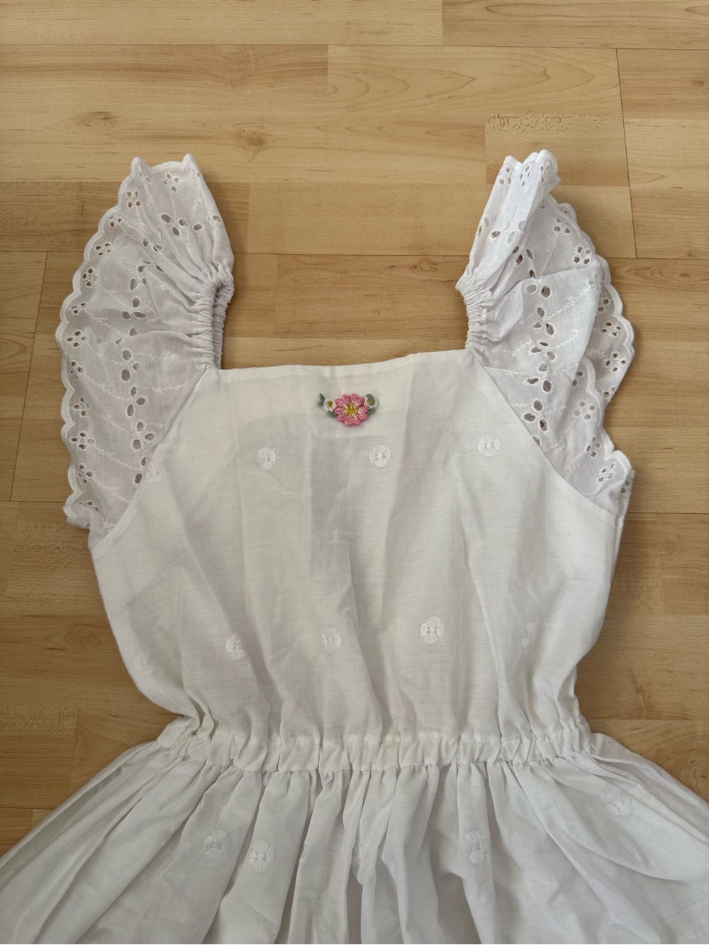 White Eyelet Sundress with Flower and Pink Ribbon Accents - Picture 2 of 10
